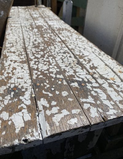 Beautiful old white chippy table with original nails.