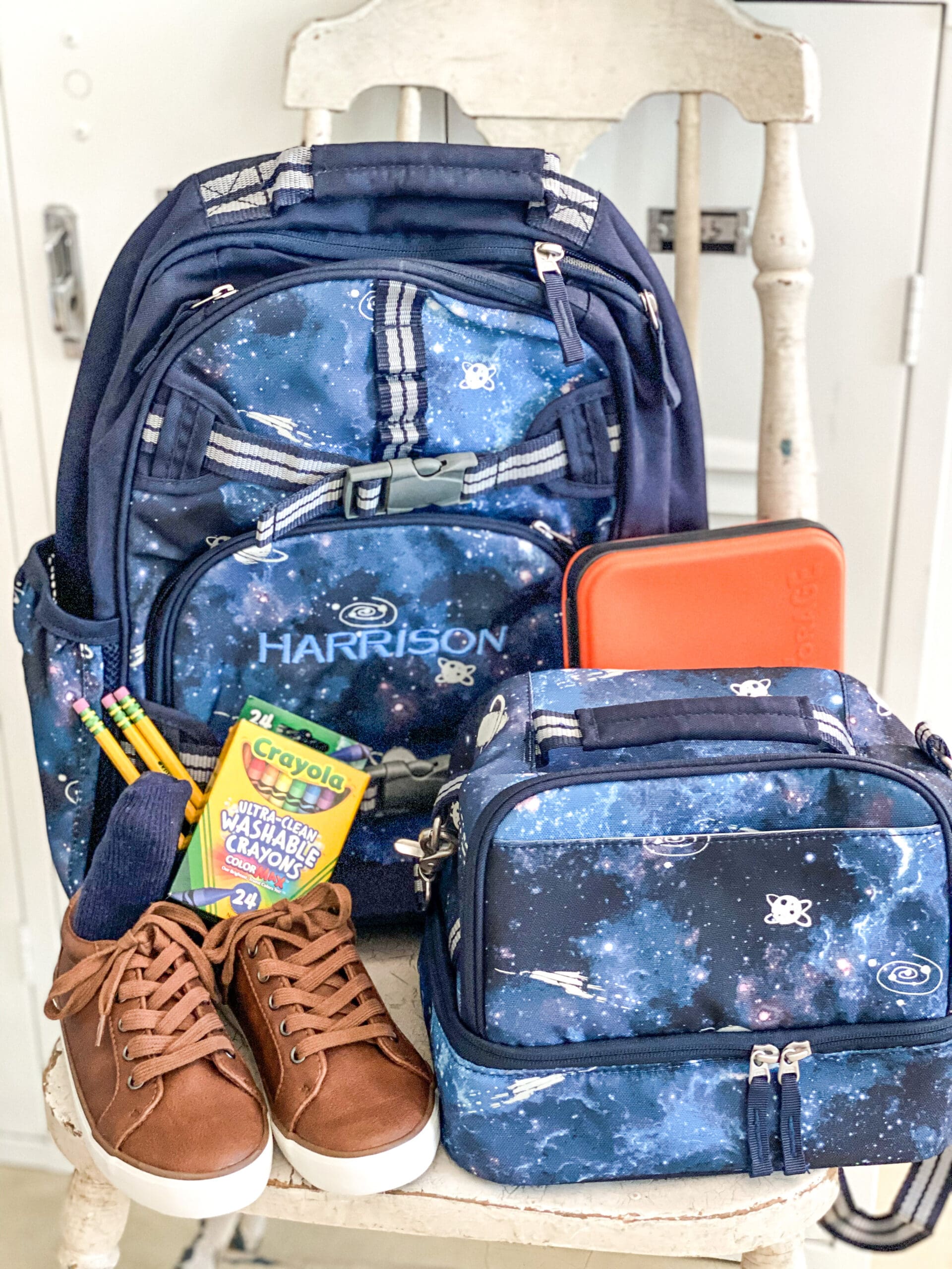 Harrison's monogrammed backpack with lunchbox & shoes with crayons & pencils