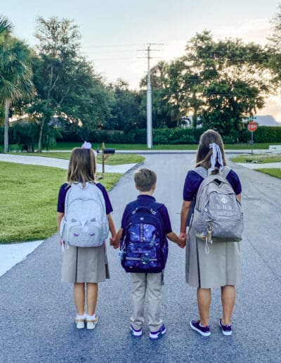 My Children walking down the road on the first day of school