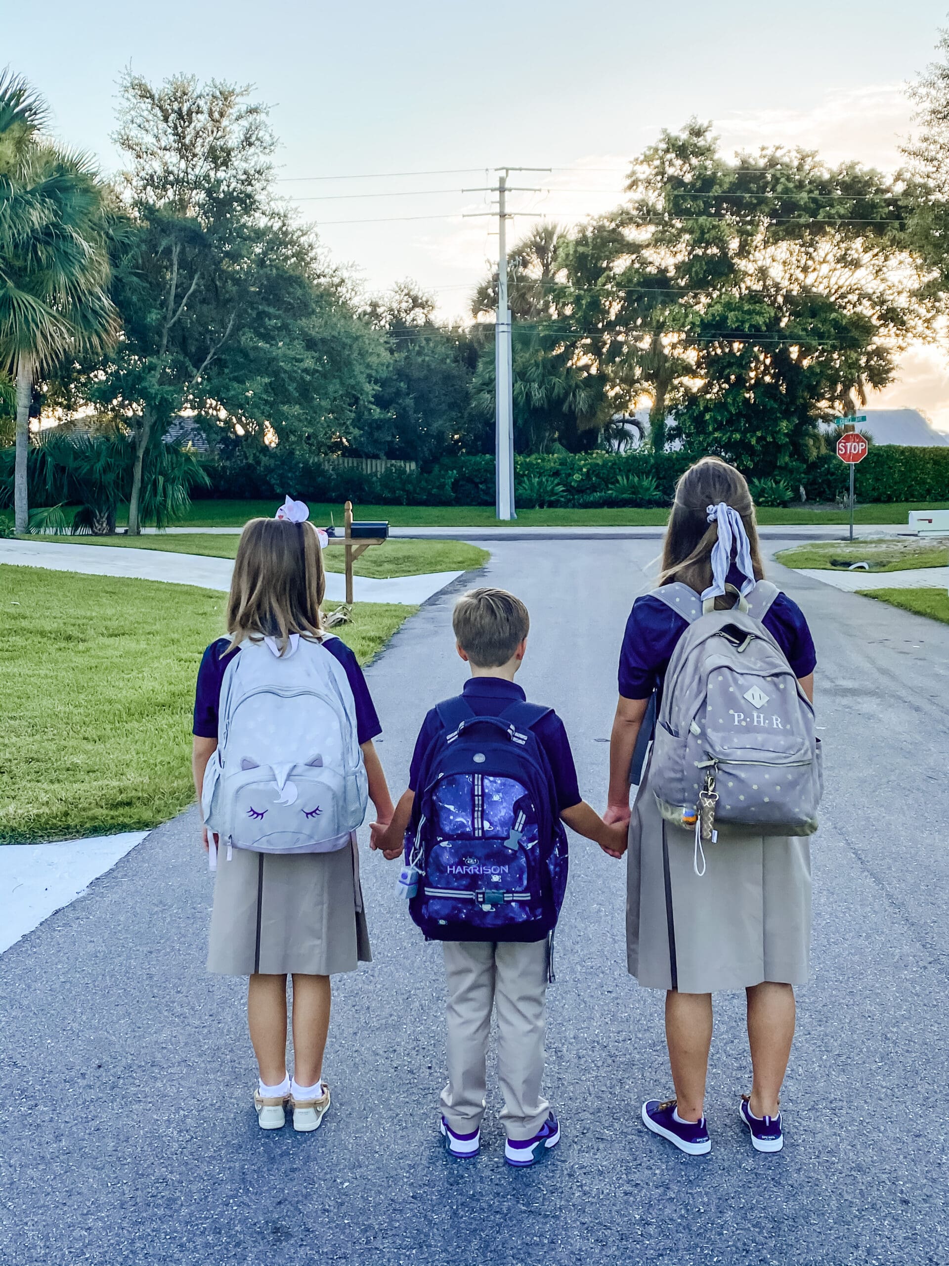 My Children walking down the road on the first day of school