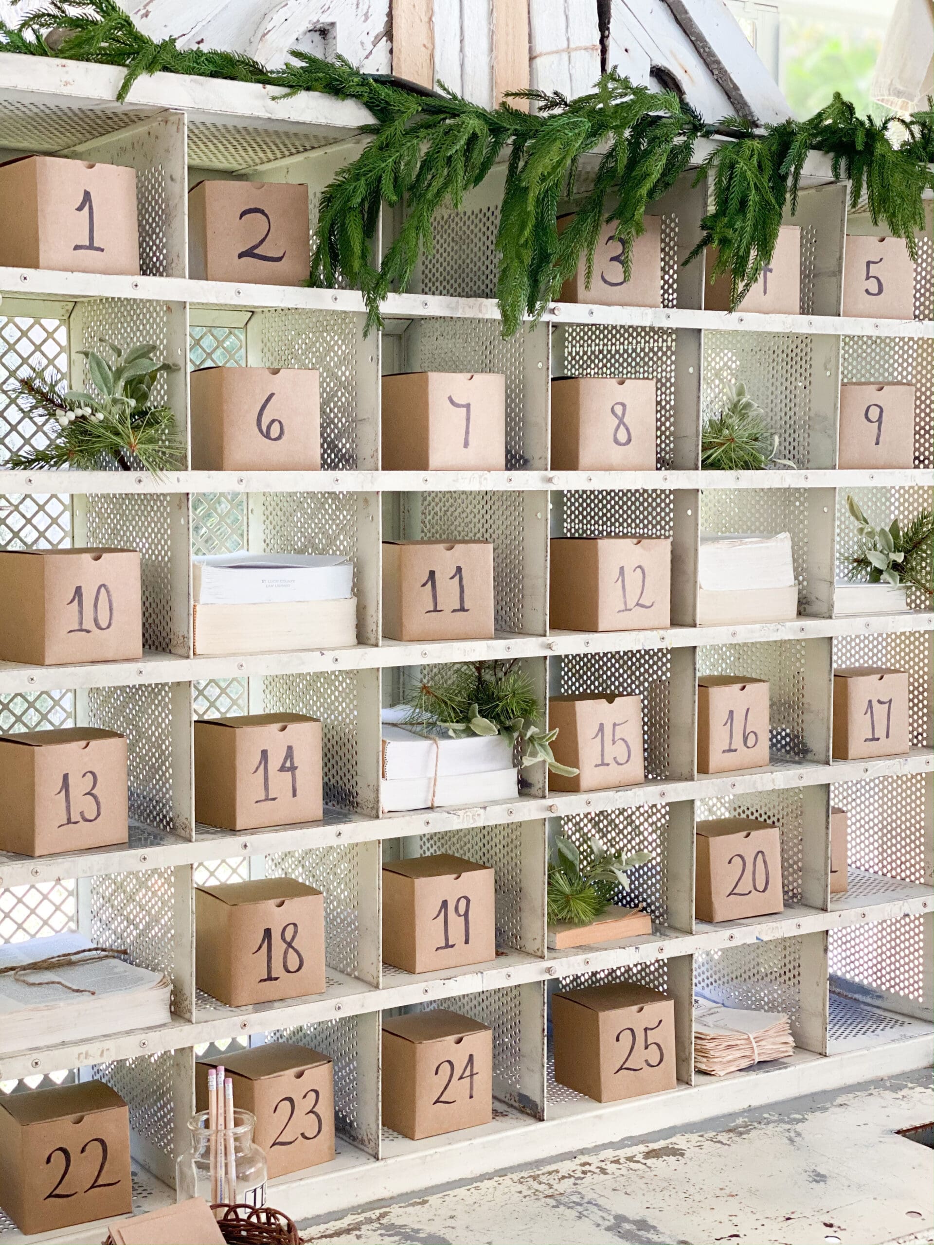 view of small cardboard advent boxes styled in a cubby