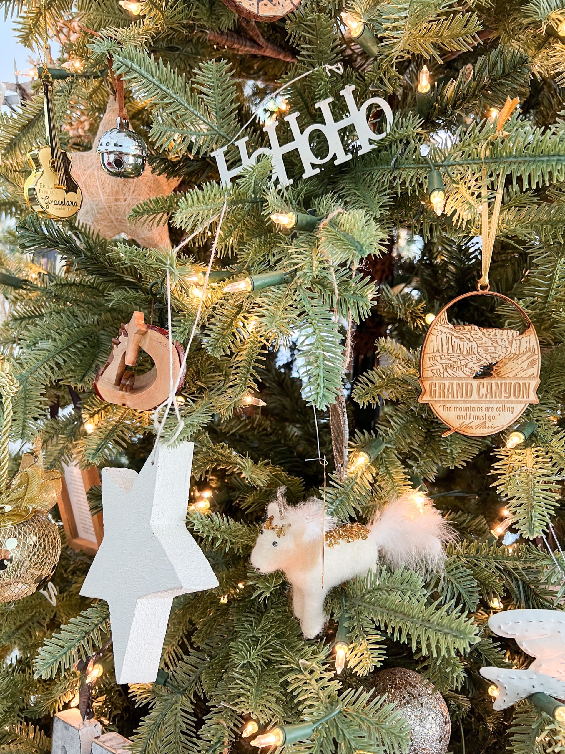 close up of unique family ornaments on a real-touch tree