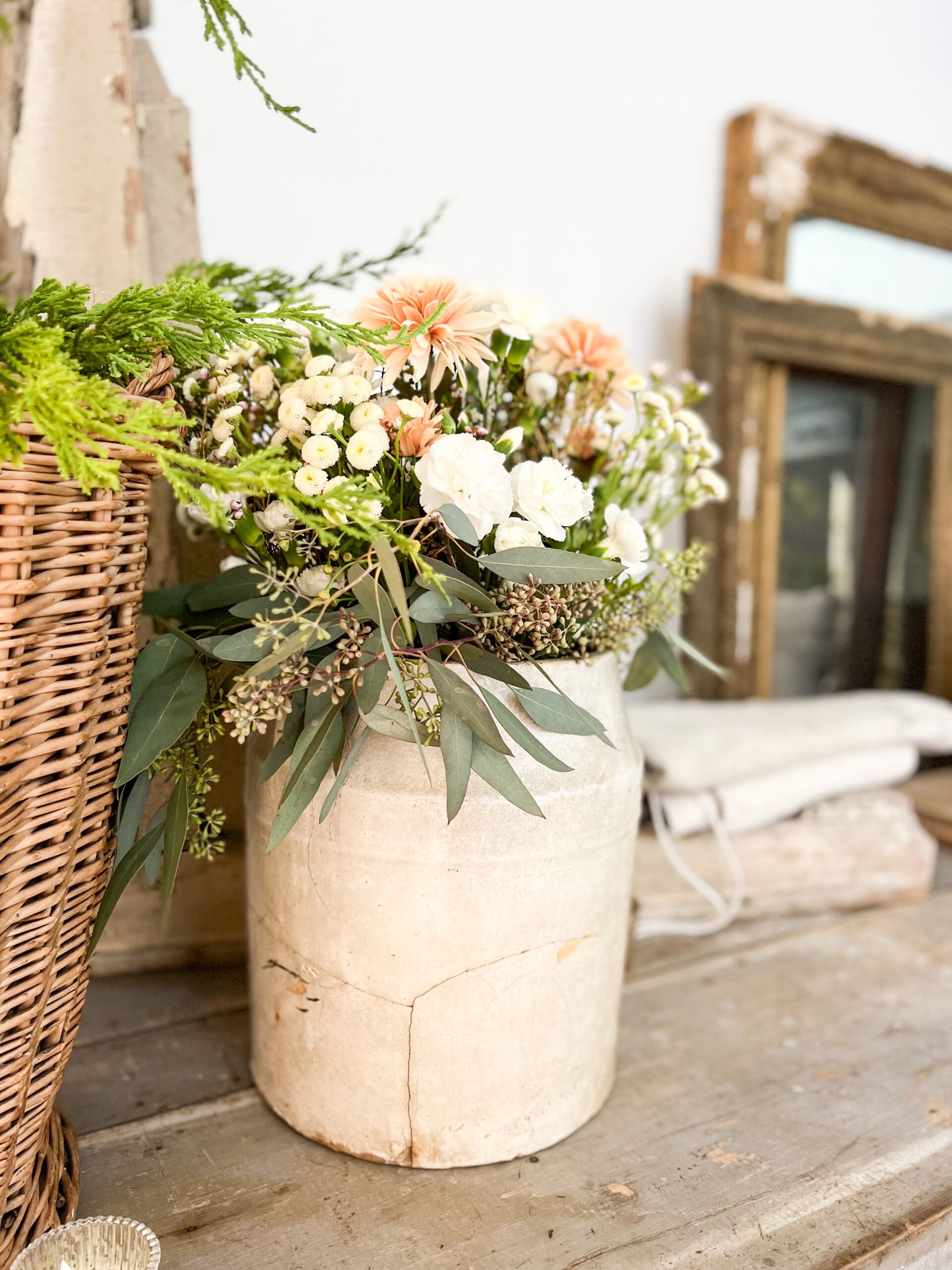 beautiful floral arrangement of both faux and fresh flowers