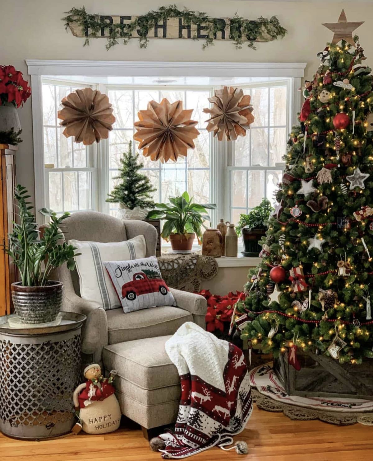 cozy Christmas space styled with a Christmas tree and snowflakes made out of paper bags