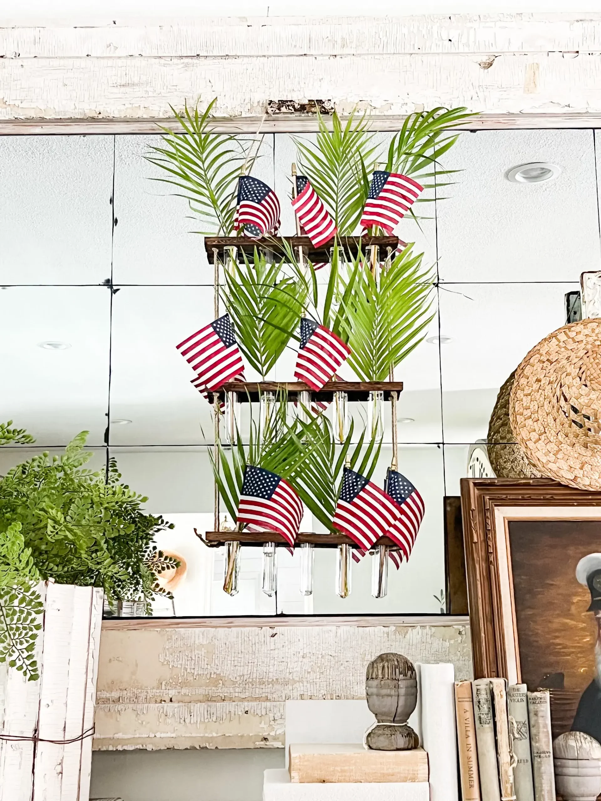 hanging wall vases holding palm fronds and flags for Memorial Day and Fourth of July